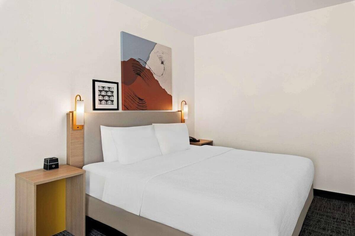 Premium bedding, pillowtop beds, desk, laptop workspace