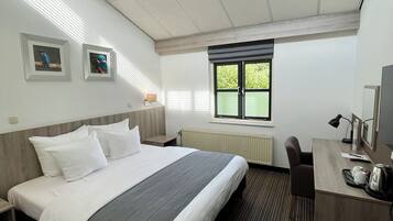 Standard Double Room | Desk, blackout drapes, iron/ironing board, free WiFi