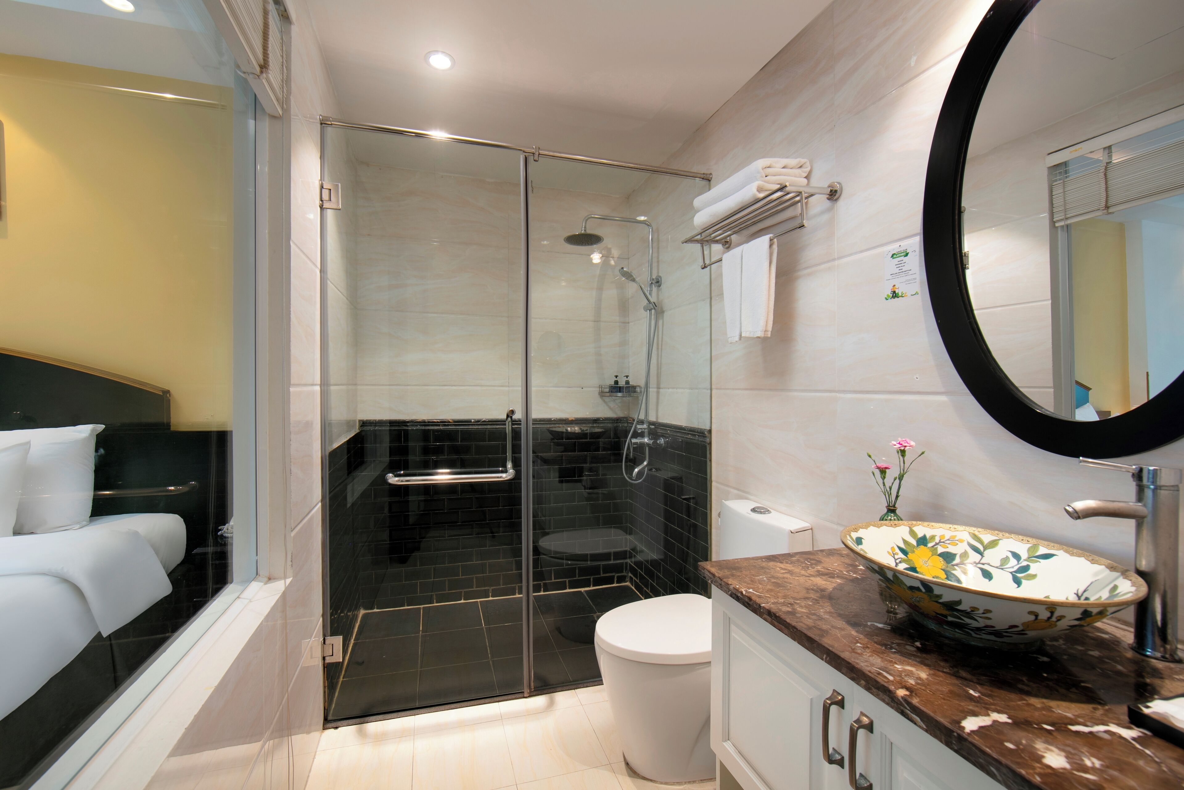 junior suite, city view | bathroom | rainfall showerhead, free toiletries, hair dryer, slippers