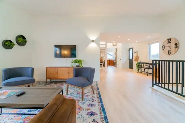 View from living area to entryway and kitchen