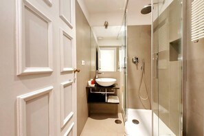 Shower, eco-friendly toiletries, hair dryer, bidet