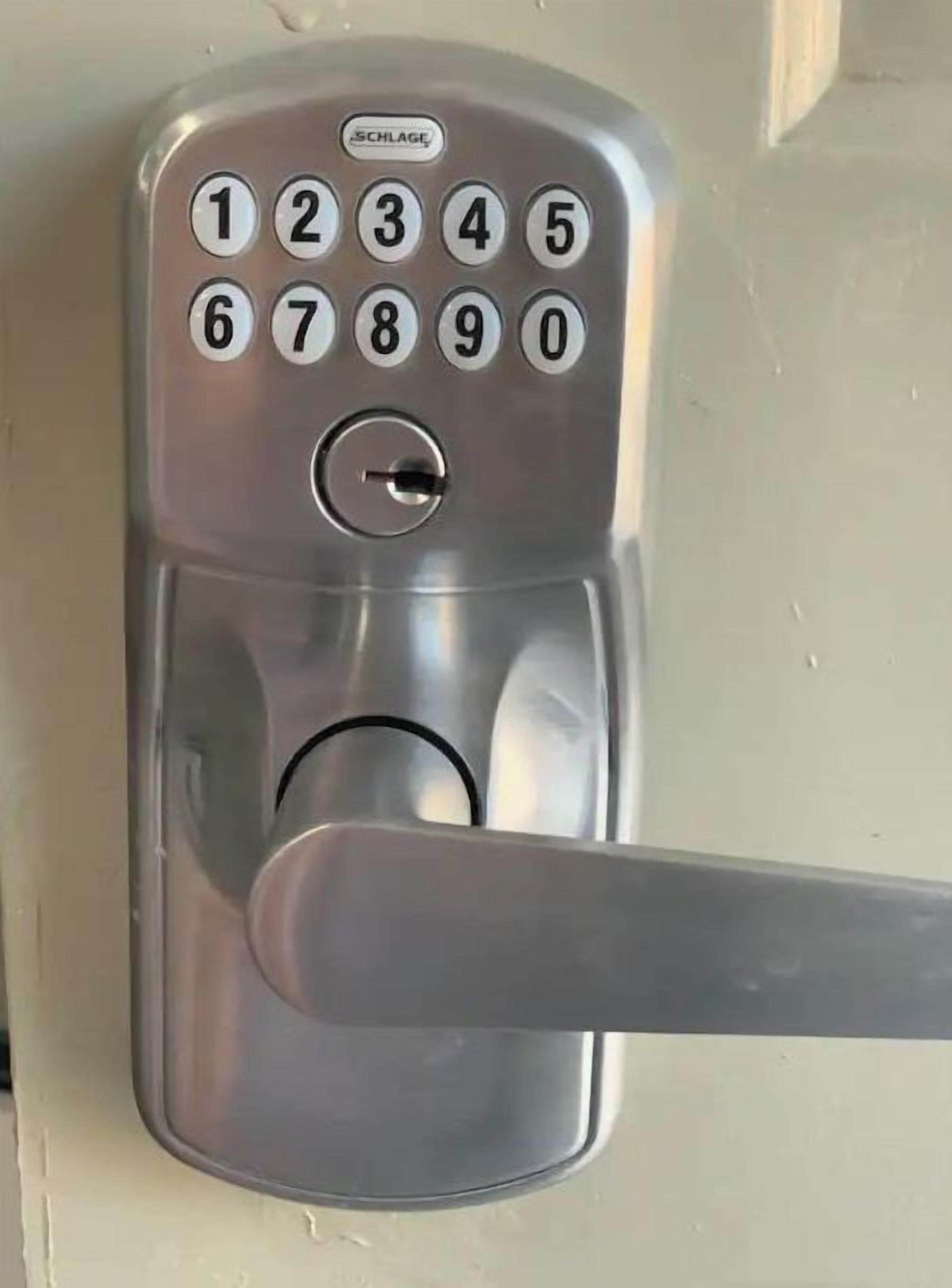A modern numeric keypad door lock.