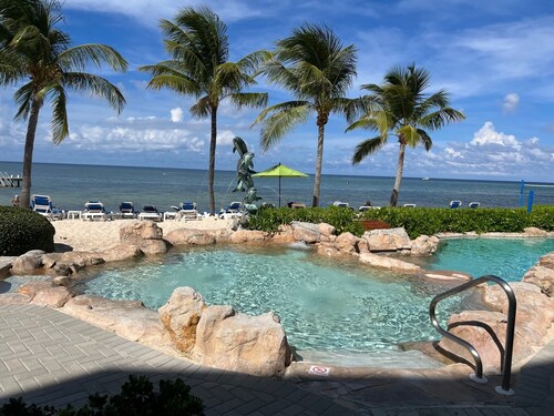 1st floor beachfront condo, just steps away from a private beach, beautiful view