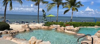 1st floor beachfront condo, just steps away from a private beach, beautiful view