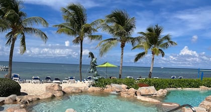 1st floor beachfront condo, just steps away from a private beach, beautiful view