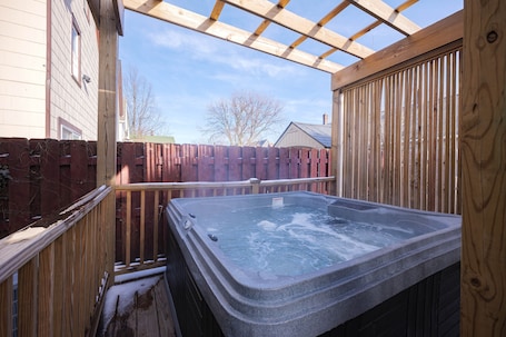 Outdoor spa tub. Lovely 2 Bedroom Unit with a Hot Tub