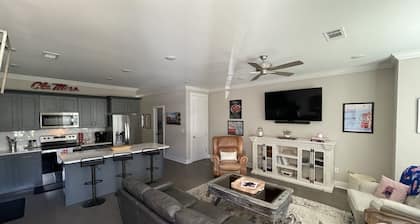 Brand new condo available, 5 minutes to stadium and 1.5 miles off the square.