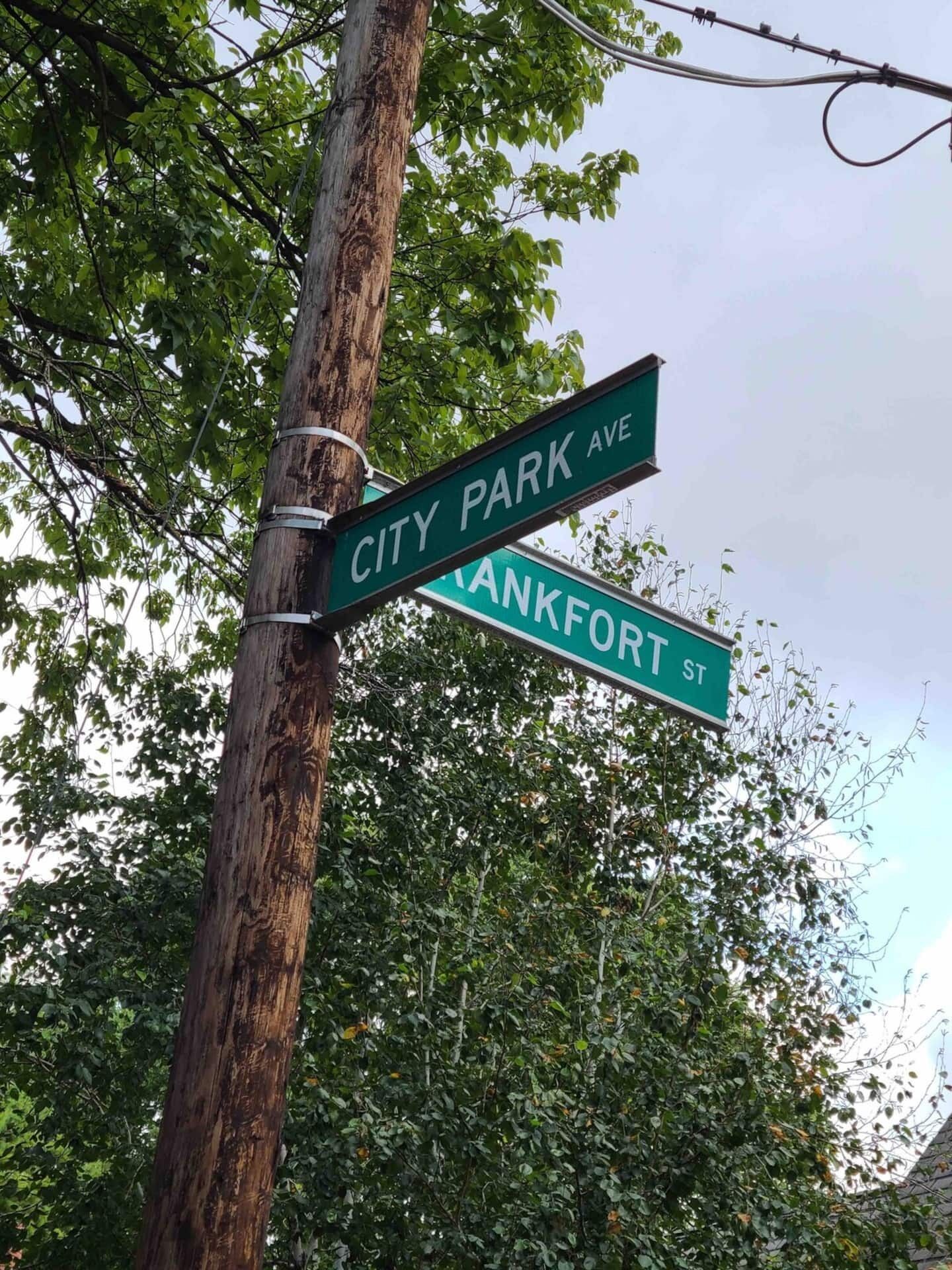 Street signs for City Park Ave and Ankerfort St.