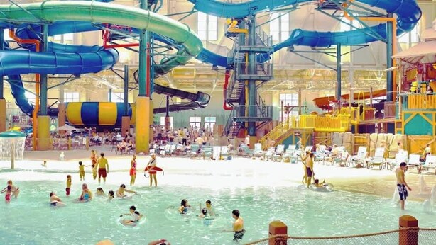An indoor water park with multiple water slides and pools. - Home Near Legends_Sleeps 8_Great Location_Shops (Kansas City)