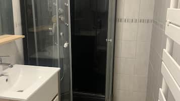 Shower, hair dryer, toilet paper