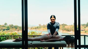 Relax on our outdoor massage terrace with a serene view of the surrounding landscape.