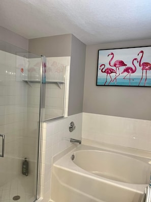 Combined shower/bathtub, jetted bath, towels, soap - Amazing heated pool 4 BR/2 baths newly renovated home with large deck! (Wesley Chapel)