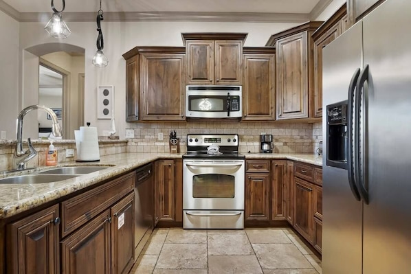 Coffee/tea maker, fridge, microwave, oven