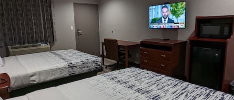 Escritorio, cortinas blackout, wifi gratis y ropa de cama