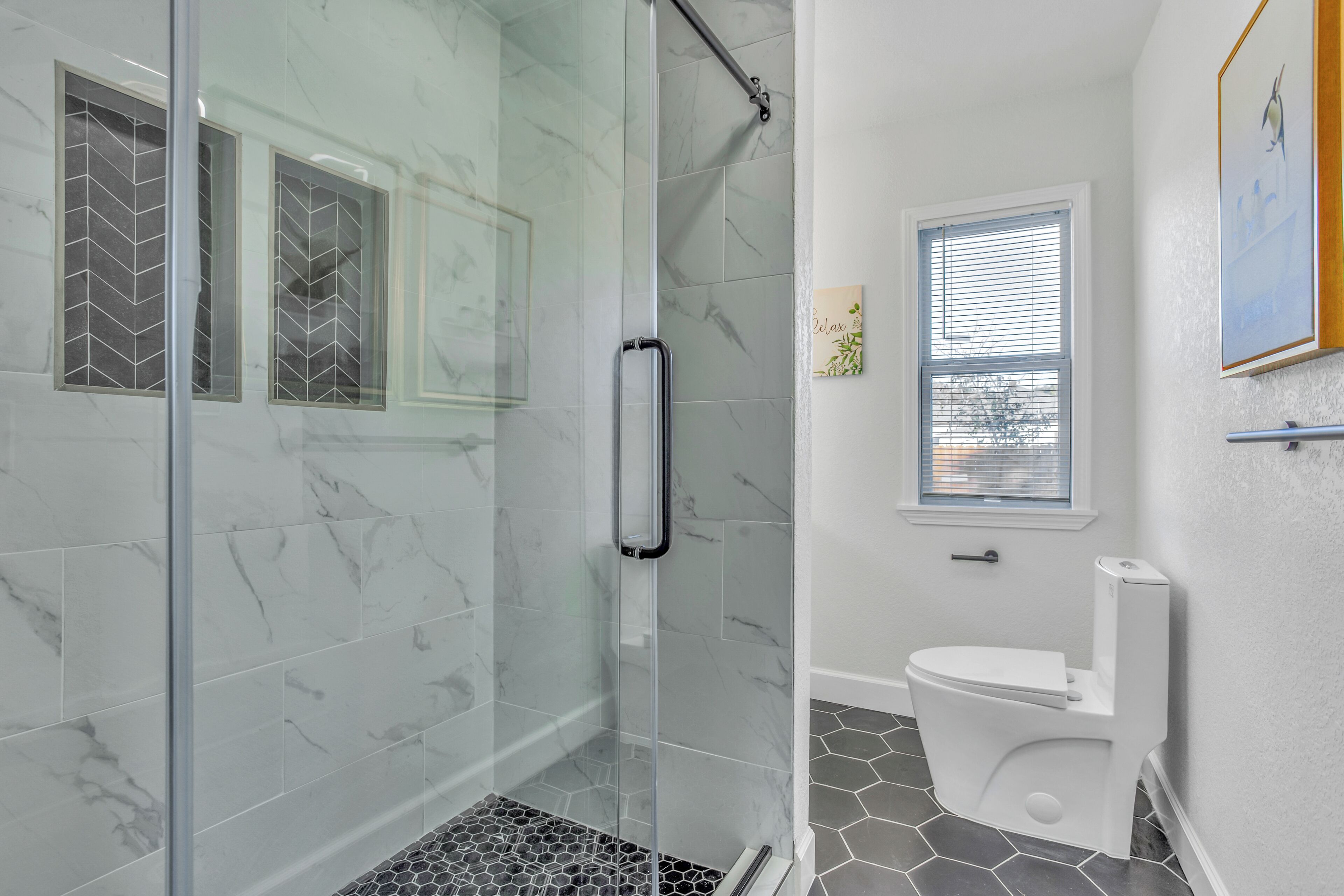 Combined shower/tub, hair dryer, towels, toilet paper