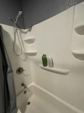 Combined shower/tub, towels, soap, toilet paper