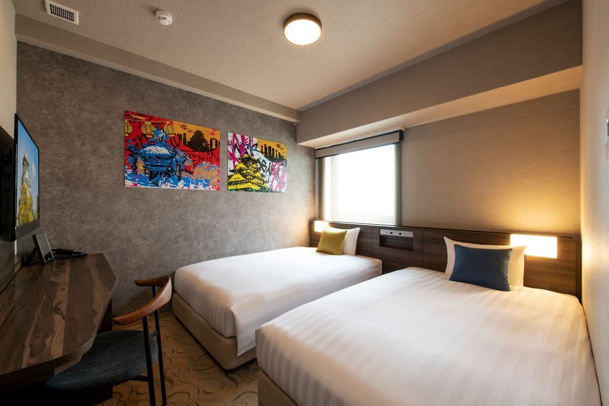 Premium bedding, down duvets, memory-foam beds, in-room safe