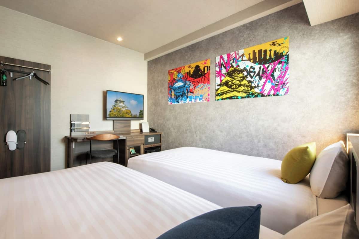 Premium bedding, down duvets, memory-foam beds, in-room safe