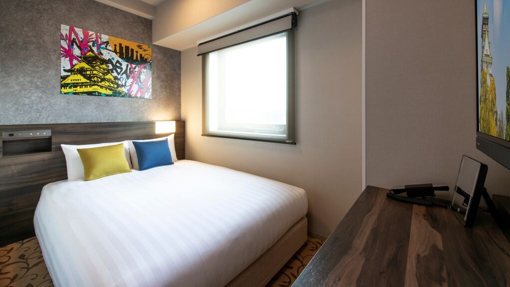 Premium bedding, down comforters, memory foam beds, in-room safe