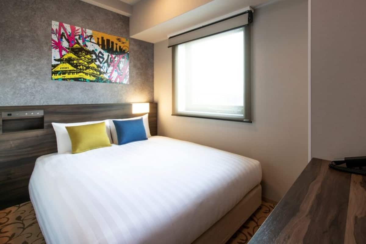 Premium bedding, down comforters, memory foam beds, in-room safe