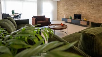 Appartamento Comfort | Area soggiorno | TV a schermo piatto