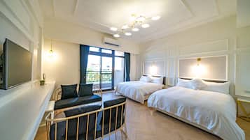 Deluxe Quadruple Room, Balcony | Minibar, individually decorated, soundproofing, free WiFi