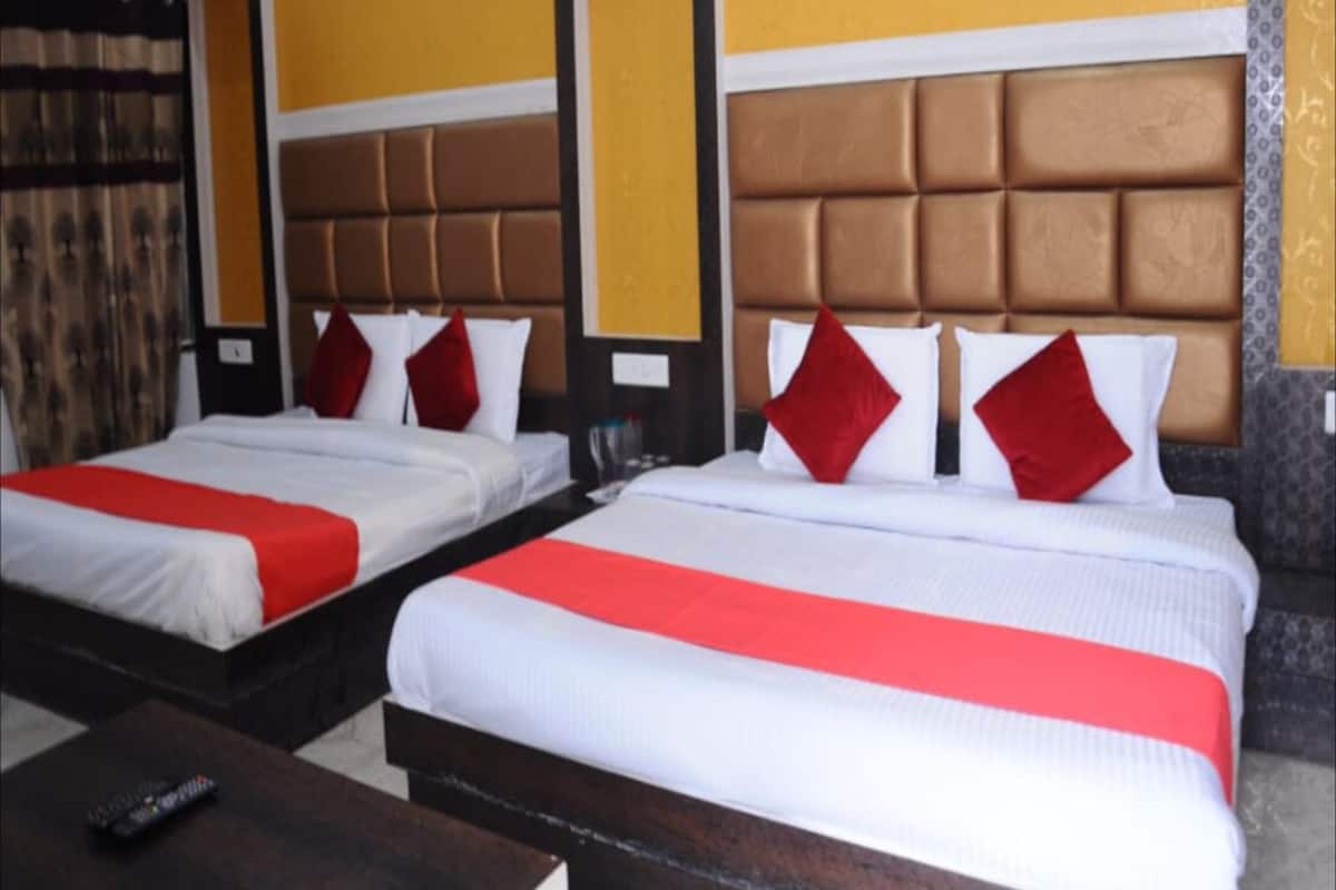 Deluxe Quadruple Room | Free WiFi, bed sheets