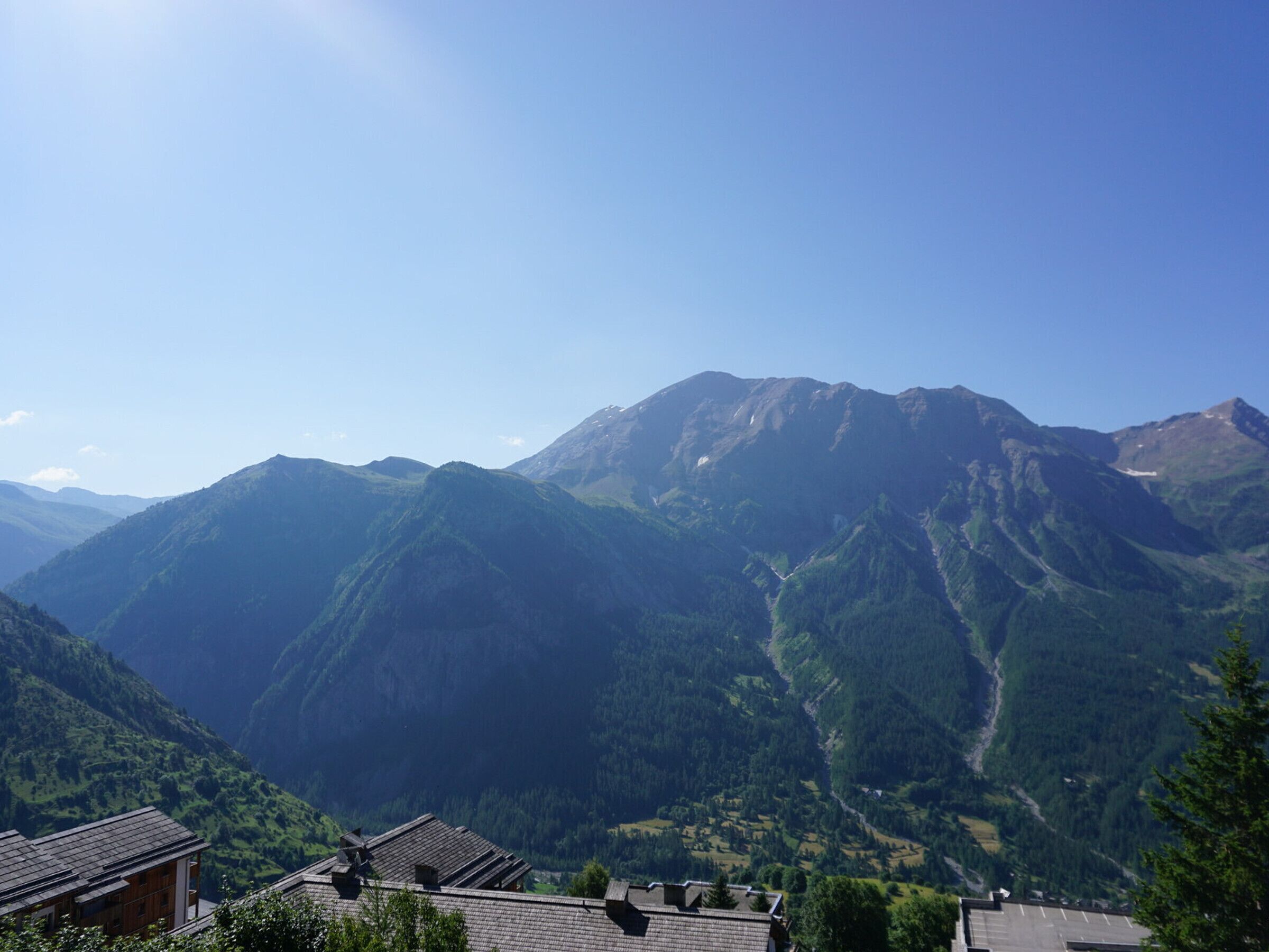 A mountainous landscape with a clear sky.
