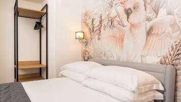 Habitación doble Deluxe, Terraza | Ropa de cama hipoalergénica, edredón y camas con efecto memoria