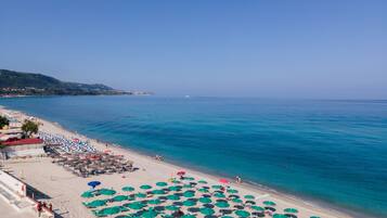 Private beach, white sand, sun-loungers, beach umbrellas