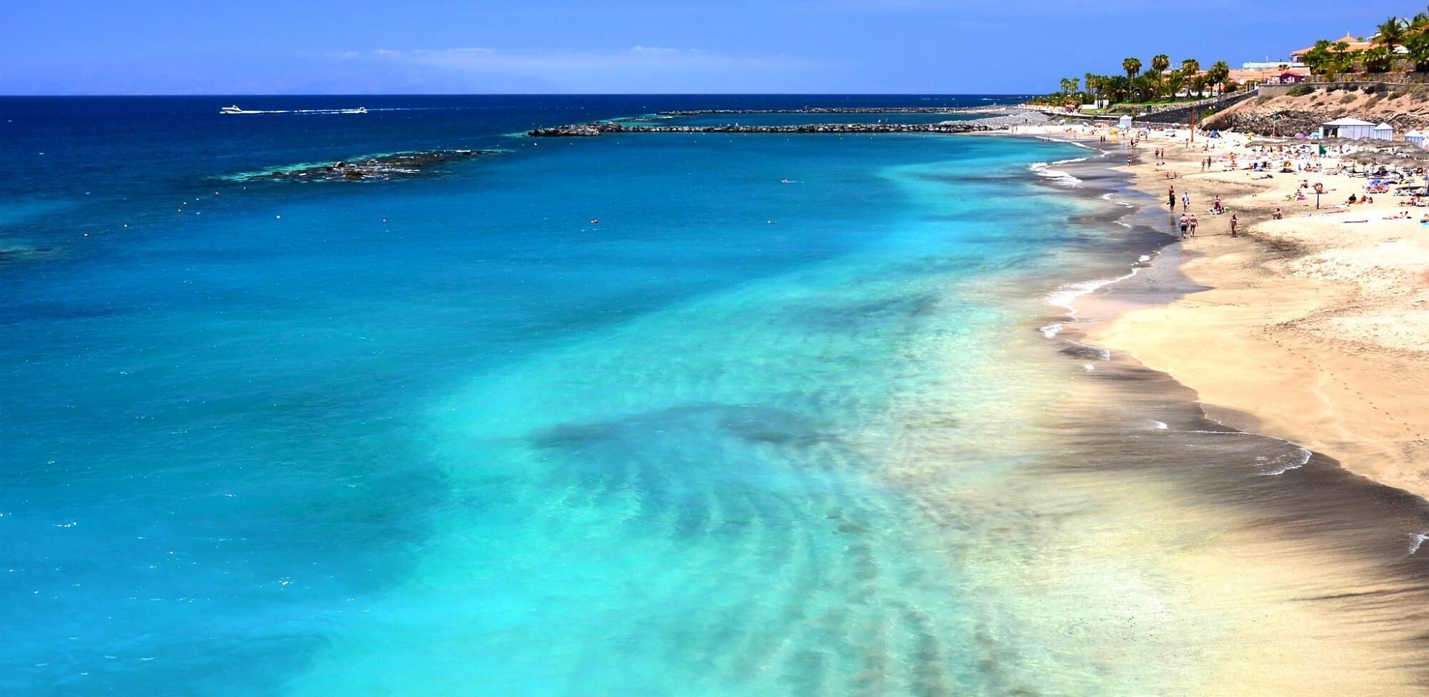 On the beach, sun loungers, beach towels