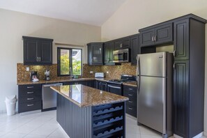 Fridge, cookware/dishes/utensils, dining tables