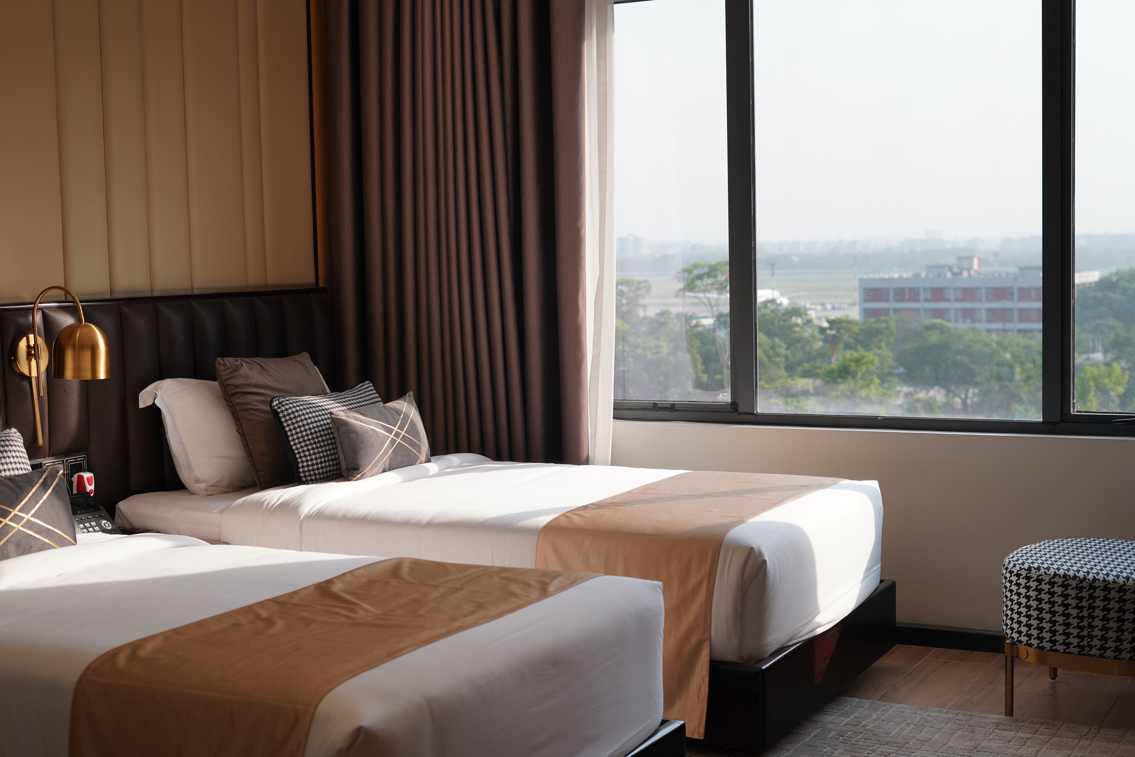 deluxe twin room | in-room safe, desk, laptop workspace, soundproofing