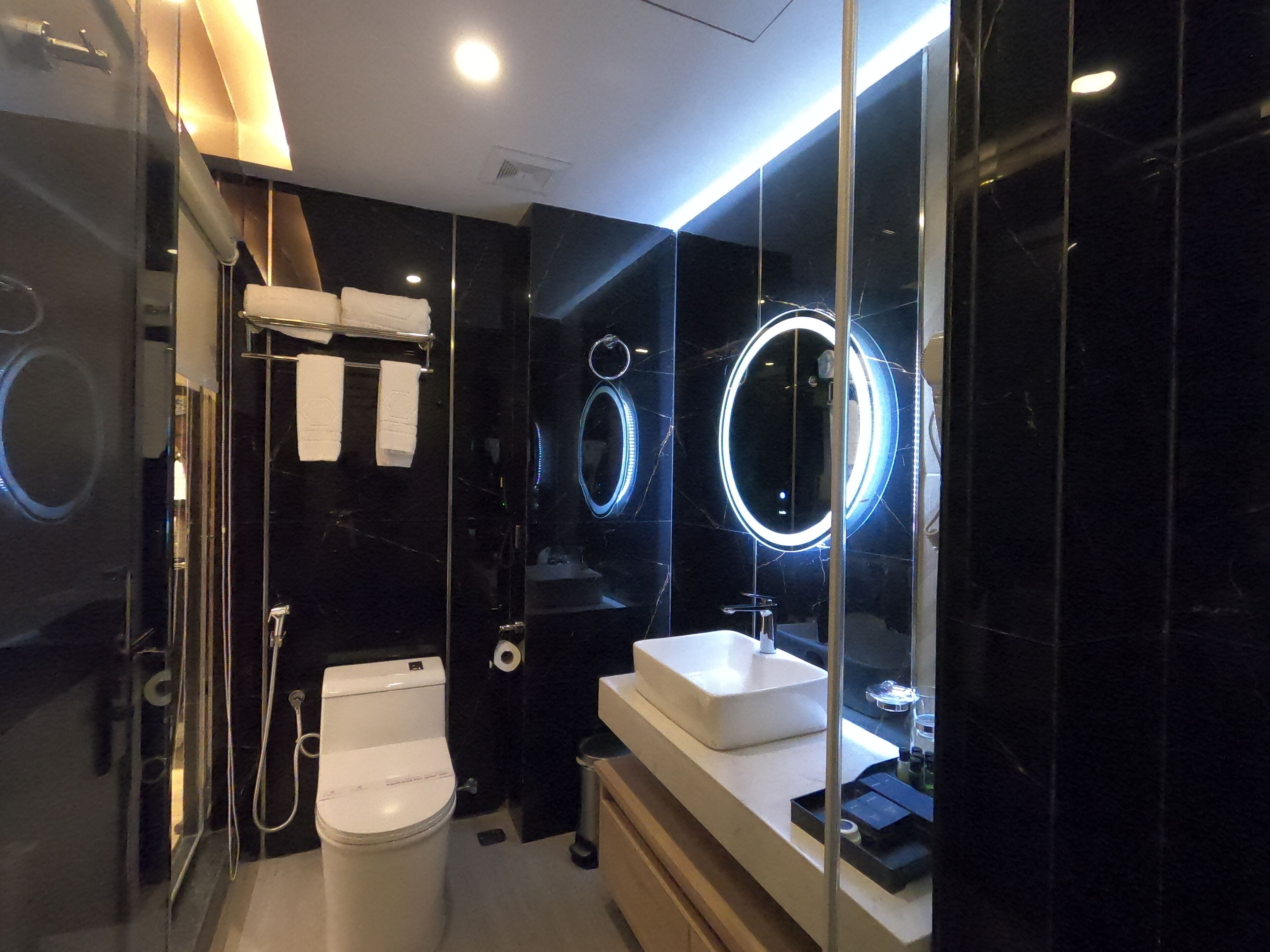 premium room (deluxe) | bathroom | shower, slippers, towels