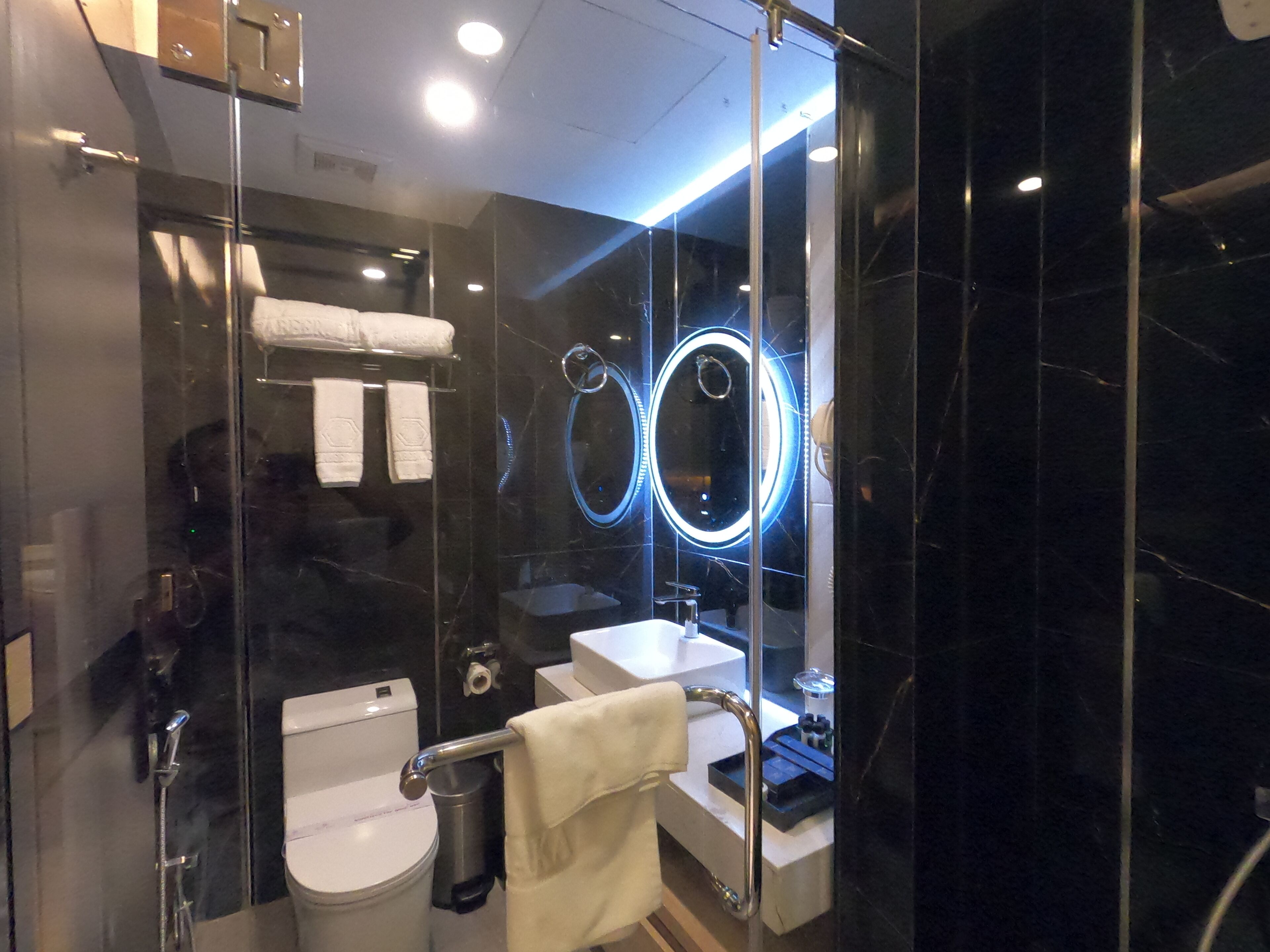 zabeer suite | bathroom | shower, slippers, towels