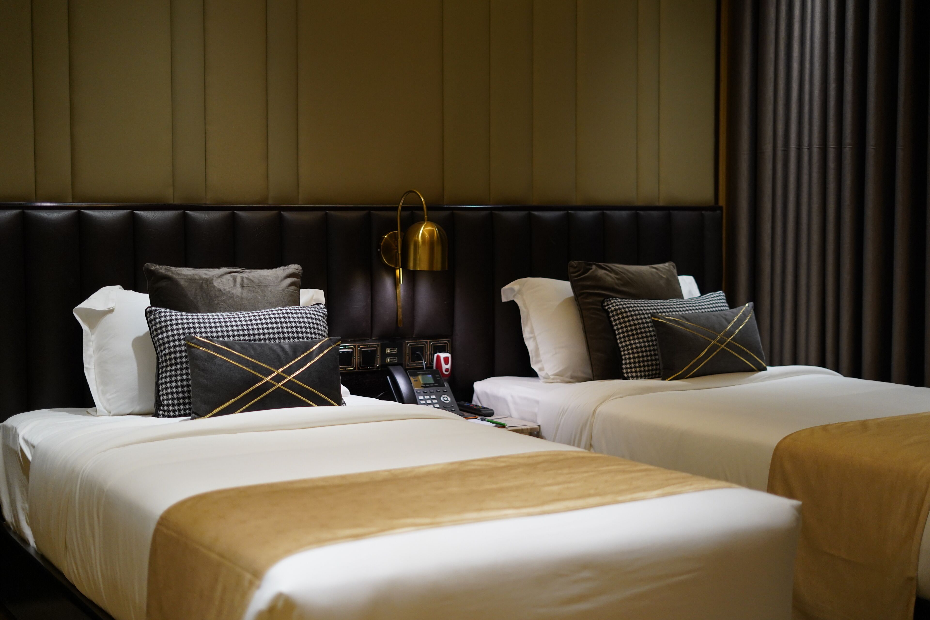 deluxe twin room | in-room safe, desk, laptop workspace, soundproofing