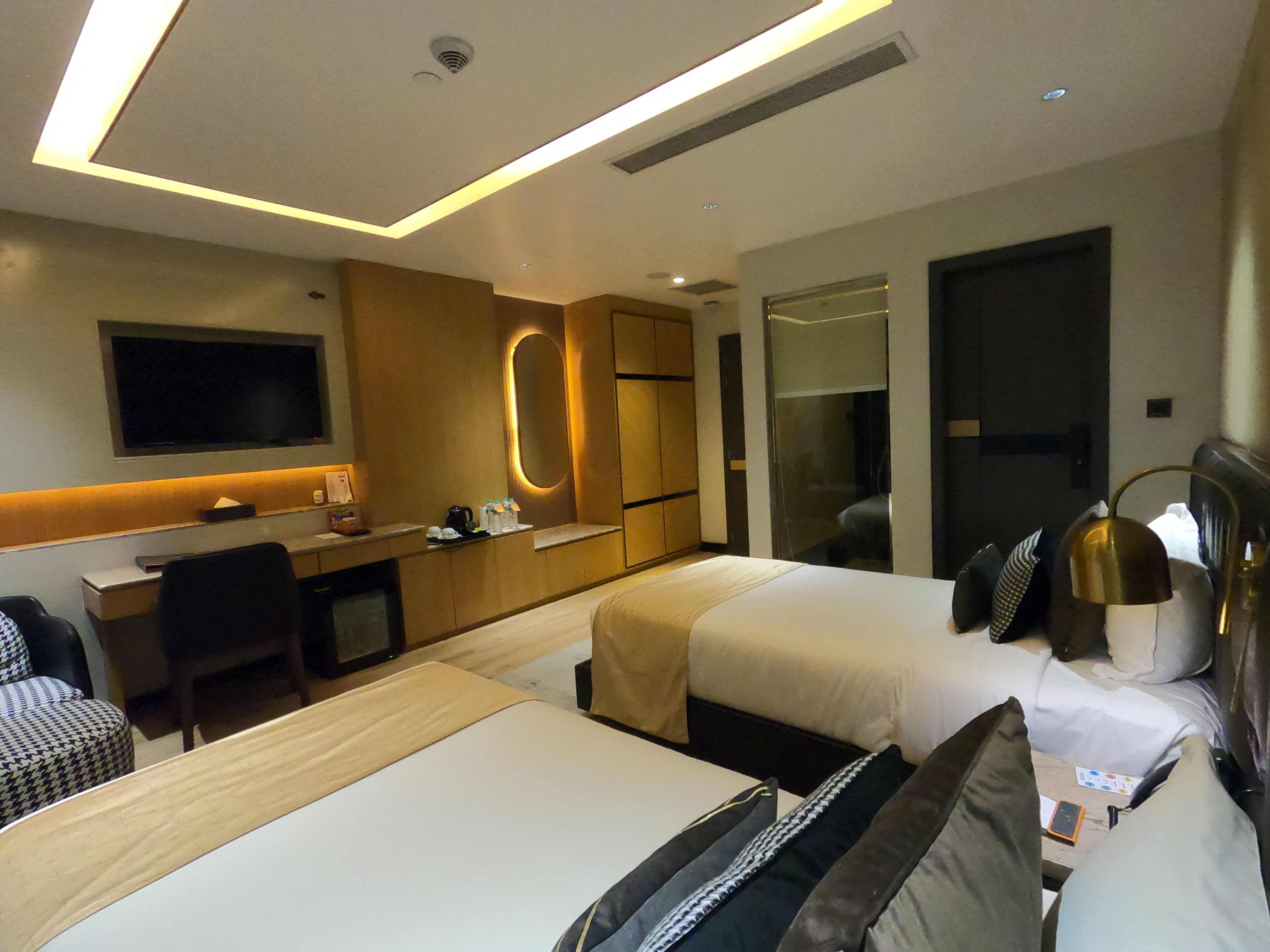 deluxe twin room | in-room safe, desk, laptop workspace, soundproofing