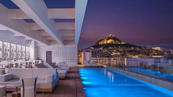 Indoor pool, seasonal outdoor pool, pool umbrellas, pool loungers