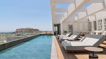 Indoor pool, seasonal outdoor pool, pool umbrellas, sun loungers