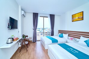 Deluxe Quadruple Room | Premium bedding, pillowtop beds, free minibar items - BOBO Boutique Hotel (Ho Chi Minh City)
