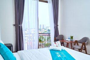 Habitación superior | Ropa de cama de alta calidad y colchones con acolchado adicional