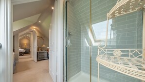 A glass-enclosed shower with a white metal frame and a skylight above. - Field Piece Cottage, Burnham Market, Norfolk (Burnham Market)
