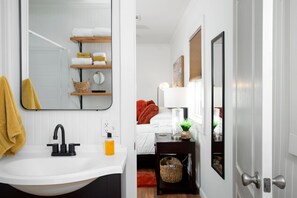 Combined shower/bathtub, hair dryer, towels, soap