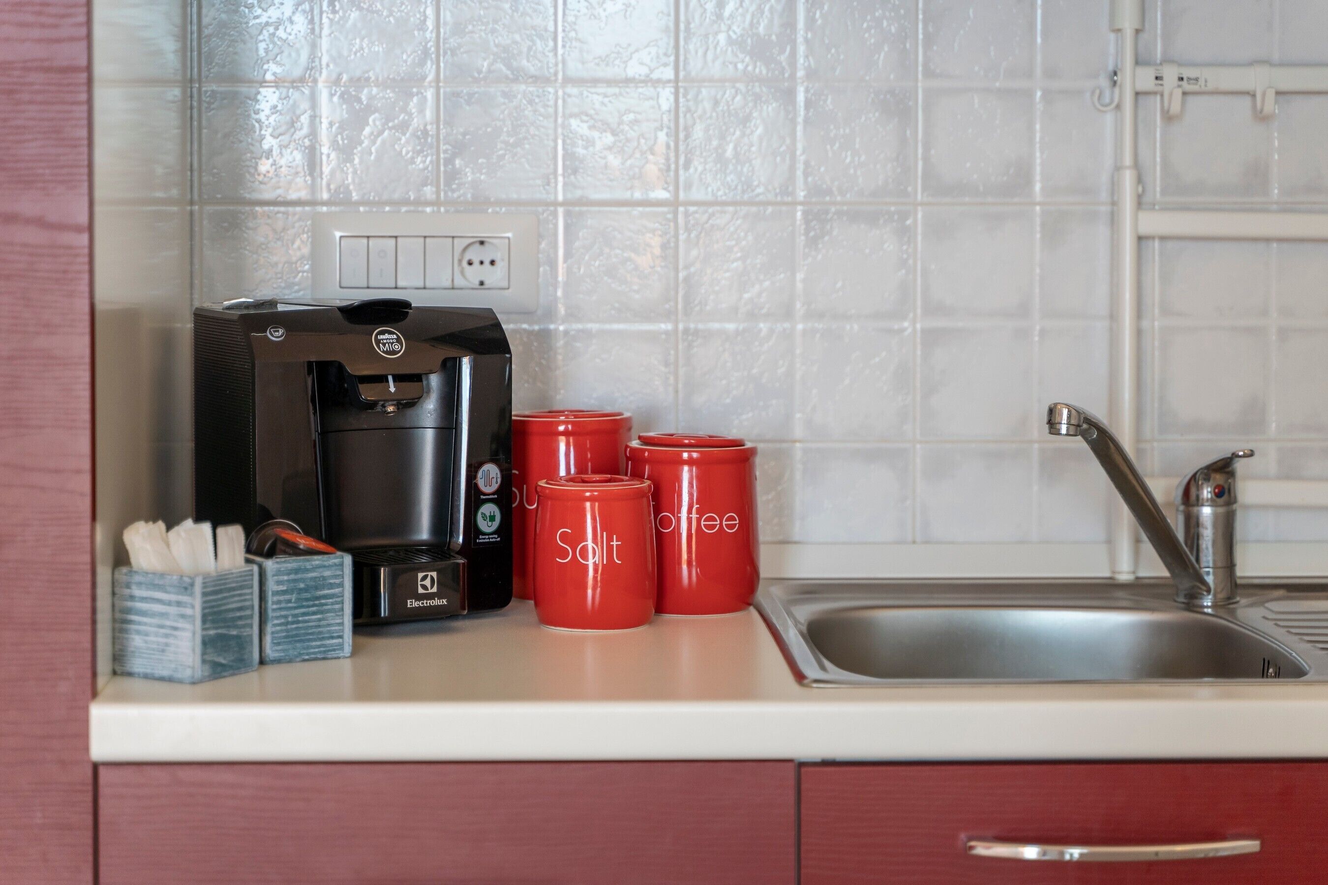 Fridge, stovetop, coffee/tea maker, cookware/dishes/utensils