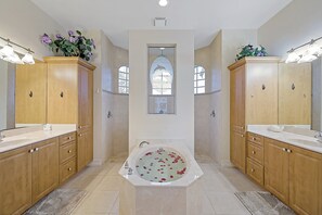 Bathtub, hair dryer, towels