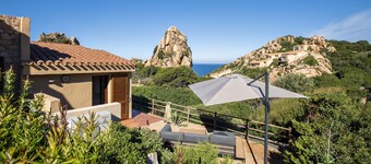 Romantic cottage nestled in the rocks