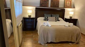 1 slaapkamer, een strijkplank/strijkijzer, gratis wifi, beddengoed