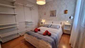 2 dormitorios, tabla de planchar con plancha, wifi gratis y ropa de cama