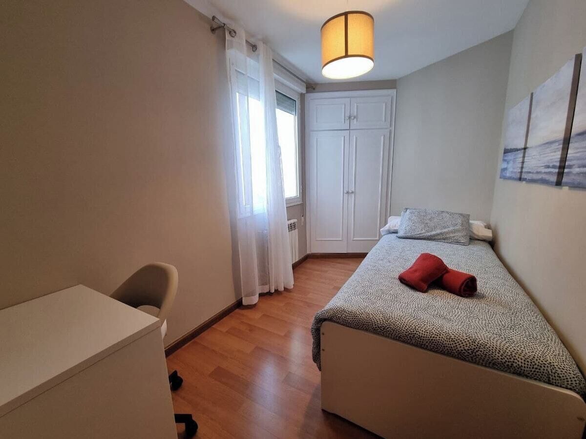 2 dormitorios, tabla de planchar con plancha, wifi gratis y ropa de cama