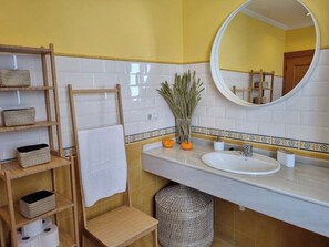 Bathtub, hair dryer, towels